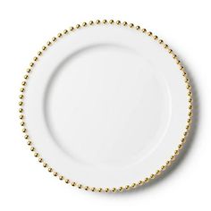 a white plate with gold beads on it