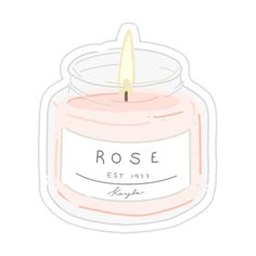 a pink candle sticker with the word rose on it and a white label that says,