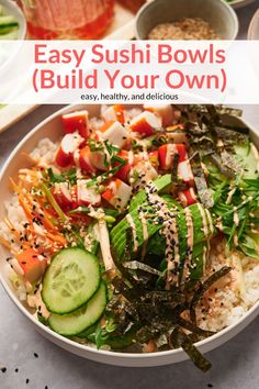 a bowl filled with vegetables and rice on top of a table