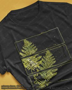 This fern leaf t-shirt is perfect for the fern lover to wear at a social gathering, on a hike, or even just as an everyday outfit. It is a great gift for anyone who spends their time enjoying nature's outdoor activities, plant nurseries, and botanical gardens. With a timeless inspired original design, this graphic tee will remain stylish for countless years to come. FABRIC CONTENT:  - Fabric content varies based on color. Solid colors are 100% cotton, heather colors are 52% cotton/48% polyester, Botanical Style Green T-shirt With Graphic Print, Green Botanical T-shirt With Graphic Print, Botanical Green T-shirt With Graphic Print, Green Nature-inspired Crew Neck T-shirt, Fern Leaf Drawing, Botanical Clothing, Botany Aesthetic, Forest Foliage, Fern Forest