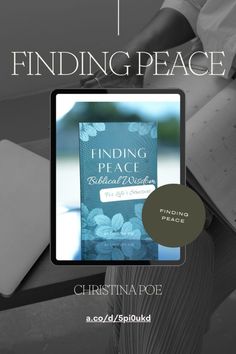 a person sitting at a table with a book in front of them and the title finding peace