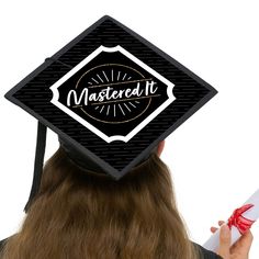 Decorate your mortarboard graduation cap to stand out from the crowd of classmates on graduation day. Mastered It Grad Cap Cover includes top piece, base piece, and poster mounts to DIY assembly a Master’s Degree “Mastered It” graduation cap topper. Use the printed guides on each the top piece and base piece to align placement of Mastered It Grad Cap Cover. The base piece will cover majority of mortarboard and top piece will give the design a three-dimensional element that covers the tassel butt Masters Degree Graduation, Degree Graduation, Mastered It, Graduation Cap Toppers, Master's Degree, Graduation Cap Decoration, Cap Decorations, Masters Degree, Grad Cap