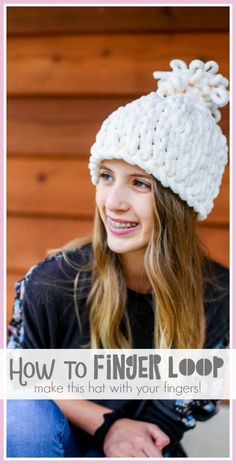 a girl wearing a white knitted hat with the words how to finger loop make this hat with your fingers