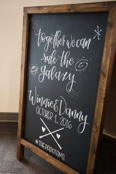 a chalkboard sign that says, together we can ride the galaxy and winne & dany october 1, 2016