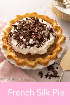 there is a pie with whipped cream and chocolate shavings on the top it