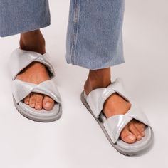 Experience the perfect blend of comfort and style with our leather slide. Crafted from flexible leather, these slides offer a snug fit that moves with you. Embrace the chunky vibe and step into ultimate relaxation without compromising on fashion.  Designed for the modern individual who values both comfort and style, our leather slides are a versatile wardrobe staple that seamlessly transitions from day to night. Pair them with your favorite jeans and a casual top for a laid-back weekend look, or Trendy Leather Slide Footbed Sandals, Trendy Leather Slides With Cushioned Footbed, Slip-on Slide Mules With Textured Footbed, Trendy Leather Slides With Leather Footbed, Trendy Leather Slide Mules, Trendy Leather Mules With Textured Footbed, Trendy Leather Footbed Slide Mules, Trendy Leather Footbed Sandals With Textured Footbed, Trendy Leather Slides With Textured Footbed