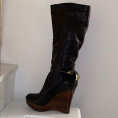 Gorgeous Soft Leather Black And Gold Leather Boots. Beautiful Wood Wedge. Chic Leather Wedge Boots With Stacked Heel, Chic Leather Wedge Boots With Round Toe, Elegant Leather High Heel Wedge Boots, Leather Wedge Heel Boots For Office, Elegant Black Platform Wedge Boots, Black Leather Wedge Boots With Stacked Heel, Leather Wedge Boots With Round Toe For Office, Leather High Heel Wedge Boots For Office, Leather Wedge Boots For Office With Round Toe