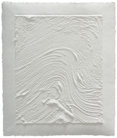 an abstract painting with white paint on paper