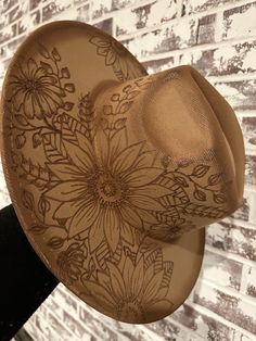 Taupe colored fedora with hand-burned sunflowers and daisies. Hat is one size 24in circumference with adjustable band inside to tighten if needed. ✨Each one is unique and no 2 are exactly alike ✨ ❤️Also I love doing custom orders if you have anything else in mind. Feel free to message me with any ideas you have. ⭐️Follow me on Facebook and Instagram  @just.plain.janie Burned Hats, Sunflowers And Daisies, Hand Burn, Felt Cowboy Hats, Taupe Color, Wood Burning, No. 2, Fedora, Custom Orders