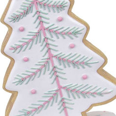 a decorated christmas tree cookie with pink and green frosting on it's edges