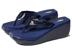 VOLATILE Frappachino - Women's Shoes : Navy Croco : Elevate your casual style with the hip, ultra-comfy VOLATILE Frappachino sandals. Slip-on style with toe post. Snakeskin-look upper straps. Lycra lining. Cushioned insole. Snakeskin-look wrapped EVA wedge heel. Rubber platform sole. Man-made upper, lining and insole. Man-made outsole. Imported. Measurements: Heel Height: 2 1 2 in Weight: 10 oz Platform Height: 1 in Product measurements were taken using size 9, width M. Please note that measurem Open Toe Gel Cushioned Flip Flops For Beach, Synthetic Toe Post Wedge Sandals, Beach Flip Flops With Gel Cushioning And Open Toe, Synthetic Toe Post Sandals With Textured Footbed, Adjustable Toe Post Wedge Sandals In Synthetic Material, Adjustable Toe Post Synthetic Wedge Sandals, Synthetic Toe Post Sandals With Ortholite Insole, Adjustable Synthetic Flip Flops With Gel Cushioning, Leather Sandals With Gel Cushioning For Beach