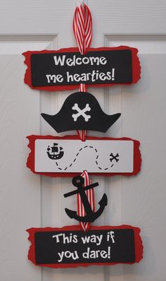 this is an image of a birthday door sign for someone's little pirate party