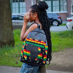 Large African Print Backpack  Our Backpacks are handmade with 100% Cotton/African Print Kente Cotton Fabric also known as Ankara Cotton Fabric. This backpack is neatly tailored, durable and has a roomy interior.  It comes with a large front pocket and 2 roomy side pockets for bottles and other items.  The handles are adjustable and will fit perfectly and comfortably on your shoulders.  This modern backpack is perfect for everyday use, outdoor activities, school, sports, work, travelling so much Casual Leather Backpack With Mobile Phone Bag, Casual Backpack With Mobile Phone Bag, Back To School Backpack With Mobile Phone Bag, Back To School Standard Backpack With Mobile Phone Bag, Multicolor Backpack With Removable Pouch, Multicolor Standard Backpack With Removable Pouch, Handmade Casual Backpack, Multicolor Shoulder Backpack For On-the-go, Handmade Black Backpack For Travel