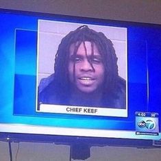 a tv screen with a man on it's face and the words chief keef