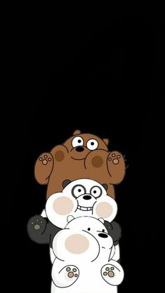 two teddy bears sitting on top of each other in front of a black background,