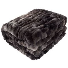 a blanket that is made out of grey fur