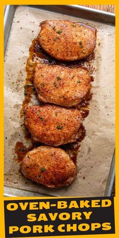 oven baked savory pork chops on a baking sheet with the words oven baked savory pork chops