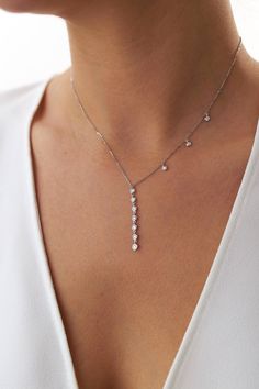 Our new elegant diamond lariat necklace. As always we craft our pieces with hand-selected natural stones and solid gold so you can admire their beauty for a lifetime.★ Necklace Features (The model in the pictures is wearing an 18k white gold necklace)• Gold Kt: 14K/18K Solid Gold - According to your preference (All pieces are stamped for authenticity)• Available Gold Colors: Yellow Gold, Rose Gold, White Gold• Total Diamond Weight: 0.32 carat• Diamond Color-Clarity: G Color VS/SI Clarity• We onl Diamond Lariat Necklace, Gold Lariat Necklace, White Gold Necklace, Gold Colors, White Gold Necklaces, Diamond Drops, Lariat Necklace, Diamond Color, Eternity Ring