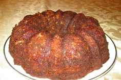 a bundt cake sitting on top of a white plate