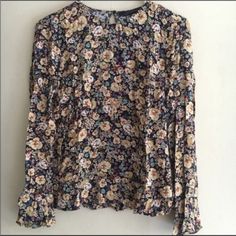 This Is A Brand New With Tags Floral Printed Top By Zara With Bell Sleeves, Size Medium. One Back Button. Beautiful Structured Fit In A Fun, Floral Print. Runs A Bit Small. Comes From A Smoke Free Pet Free Home. Bundle For More Discounts. Fun, Flirty, Romantic, Bohemian, Yet Polished! 100% Viscose Zara Multicolor Floral Print Blouse, Zara Floral Print Tops For Fall, Yellow Floral Print Blouse For Work, Yellow Floral Print Top For Work, Zara Floral Print Tops For Work, Fitted Yellow Zara Blouse, Casual Floral Print Blouse, Casual Blouse With Floral Print, Zara Ruffle Top