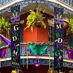 mardi gras decorations on the balcony of a building in new orleans, usa