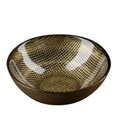 a brown and white bowl sitting on top of a table