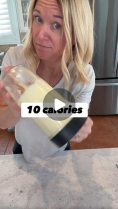 a woman is pouring something into a blender in her kitchen with the words 10 calories on it