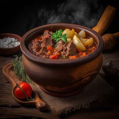 a wooden bowl filled with meat and vegetables