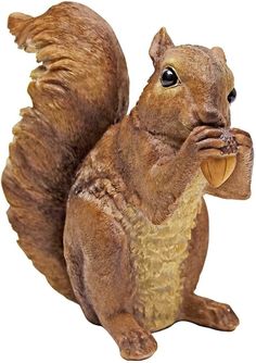 a statue of a squirrel eating a nut