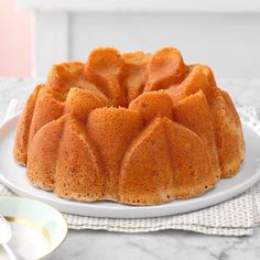 a bundt cake sitting on top of a white plate