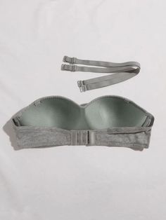 Discover ultimate comfort and versatility with our Solid Wireless Bra With Detachable Design Strap. Thoughtfully designed, this bra features a detachable strap for customizable support. Embrace a seamless fit and effortless elegance, redefining your daily wear with a touch of refined style.Specifications: Pattern Type: Plain Wires: Wireless Fabric: High Stretch Composition: 93% Cotton, 7% Elastane Care Instructions: Hand wash, do not dry clean Chest pad: No Padding Size Chart(in): Size Length Un Strapless Bra With Padded Cups, Gray Stretch Push-up Bra, Gray Underwire Bra With Padded Cups, Adjustable Push-up Bra, Adjustable Full Coverage Bra With Built-in Bra, Adjustable Underwire Bra, Adjustable Full Coverage Bra With Padded Cups, Fitted Gray Push-up Bra, Gray Fitted Push-up Bra