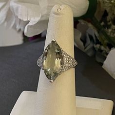 Sterling Silver Marquise Prasiolite & Cubic Zirconia Pave Sides Ring  Size 6 1/4      Weighs 3.2dwt. Stamped 925. Prasiolite measures ~19.5x10mm. In Good Condition. Thank you for Looking :) Formal Green Amethyst Ring With Accent Stones, Oval Green Amethyst Jewelry With Gemstone Accents, Green Amethyst Jewelry With Center Stone, Formal Green Amethyst Ring With Gemstone Accents, Green Amethyst Rings With Gemstone Accents For Wedding, Green Amethyst Wedding Rings With Gemstone Accents, Fine Jewelry With Green Amethyst And Accent Stones, Green Marquise Rings With Diamond Accents, Green Marquise Ring With Diamond Accents