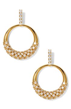 Prong-set cubic zirconia cast unparallelled shine in these 18-karat gold-plated frontal hoops. 1 1/4" drop; 7/8" width Post back 18k-gold plate/cubic zirconia Imported Gold Dazzling Hoop Earrings With Pave Setting, Dazzling Gold Hoop Earrings With Pave Setting, Gold Hoop Earrings With Pave Setting, Gold Diamond Hoop Earrings For Party, Dazzling Gold Hoop Diamond Earrings, Dazzling Gold Hoop Earrings With Diamond Accents, Dazzling Gold Hoop Earrings, Gold Sparkling Diamond Hoop Earrings, Glamorous Gold Diamond Hoop Earrings