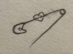 a drawing of a pair of scissors with a heart on it's end and a hook in the middle