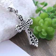 "The Irish Catholic priest will have no hesitation telling you that the Celtic Cross is a symbol of eternity that emphasizes the endlessness of God's love as shown through Christ's sacrifice on the cross. The crucifixion and resurrection Christ continues to offer the hope of salvation to the faithful throughout all time. Cast using 100% sterling silver, no pewter, nickel or lead was used to create this tree of life, buy with peace of mind. . Big collection of Crosses this link http://etsy.me/1kX Celtic Cross Necklace, Om Jewelry, Irish Cross, Irish Catholic, Harmony Ball, The Crucifixion, Silver Cross Necklace, Catholic Priest, Symbolic Jewelry