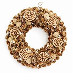 The delicate balance of golden tones and natural elements is artfully achieved. Napa Home and Garden Size: 24" H x 24" W x 4" D Napa Home and Garden Pine Wreath - Wreaths in Brown;gold | Size 24" H x 24" W x 4" D | Perigold Holiday Pine Cones, Pearl Wreath, Classic Wreath, Silk Wreaths, Holiday Throw Pillow, Pine Christmas Tree, Rustic Crafts, Pine Wreath, Pinecone Wreath