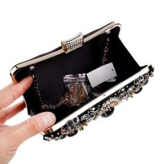 Product Details: For those must-carry essentials Hasp closure Beaded design Material: Polyester, pearl Size: 20x12cm/7.9"x4.8" Elegant Black Beaded Clutch, Elegant Evening Bag With Black Beads For Party, Black Beaded Rectangular Clutch, Elegant Black Beaded Evening Bag For Party, Black Clutch With Rhinestones For Events, Black Beaded Evening Bag For Gift, Black Embellished Rectangular Clutch, Embellished Black Rectangular Clutch, Black Beaded Evening Bag As Gift