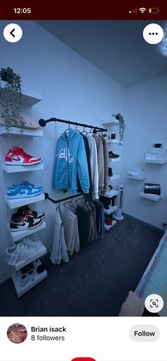 an image of a room with clothes hanging on the wall and other items in the closet