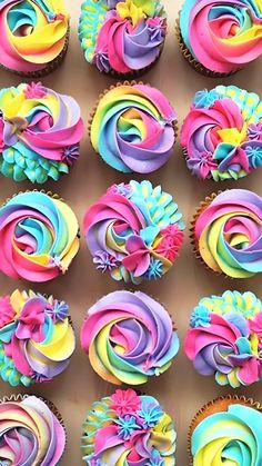 the cupcakes are colorfully decorated and ready to be eaten