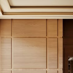 a wooden paneled wall in a room