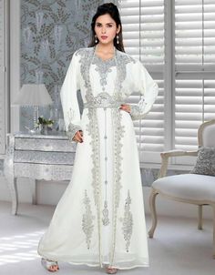 Mashallah! ❤️ Effective Embroidered Full Length Kaftan Dress-White Shop Now : https://bit.ly/3s7MvSP Buy online @ $252.95 #elegantkaftandresses #fancycaftan #fancycaftans #fancykaftan #imagesofkaftan #kaftandesign #kaftandesigns #kaftandressesdubai #kaftanstylemaxidresses #kaftansdesigns #kaptanclothes #khaftandress #ladieskaftandresses #longkaftandresses #kaftanegyptian #kaftansuits #womenkaftans #kaftandresswomen #arabkaftan #arabapparel Dress Modern Elegant, Green Kaftan, Amazing Embroidery, Long Length Dresses, Moroccan Kaftan, Royal Wedding Dress, Islamic Dress, Moroccan Caftan, Arab Fashion