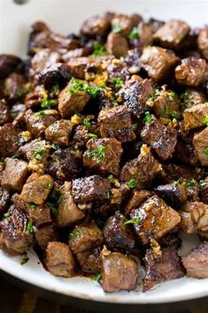 a close up of a plate of food with meat