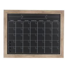 a wooden frame holds a blackboard with an arrow on the front and calendars on the back