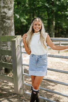 Elevate your wardrobe with our Zoe Top-Cream! This sleek knit top features a flattering turtle neck and sleeveless design for a sophisticated look. The split side hem adds a touch of modern style. Comfortable and chic, this top is perfect for any occasion. 60% cotton, 40% acrylic Model is 5'6" with a 34" bust, 27" waist, and 36" hips wearing a size small Casual Turtleneck Tank Top For Spring, Chic Summer Turtleneck Tank Top, Style Comfortable, Dresses By Length, Top Sales, Short Rompers, Set Dress, Dresses For Sale, Modern Style