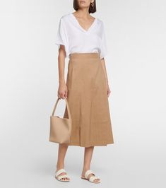 Buckle linen-blend wrap skirt in beige - Vince | Mytheresa Linen Skirt For Vacation, Chic Linen Wrap Skirt With Lining, Chic Linen Lined Wrap Skirt, Chic Linen Wrap Skirt With Lined Detail, Flared Wrap Skirt For Work, Chic Wrap Skirt For Spring, Spring Belted Wrap Skirt In Relaxed Fit, Versatile Cotton Skirt For Work, Chic Belted Wrap Skirt For Summer