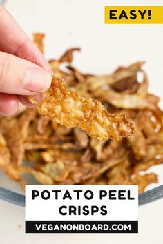 a hand is dipping some food into a bowl with the words potato peel crisps