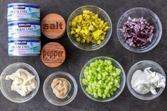 six bowls with different types of food in them and labeled salt, pepper, mustard, mayonnaise, and other ingredients