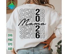 the back of a woman's white shirt with black lettering on it that says senior, senior, senior and senior