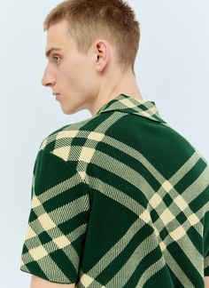 Check polo top in wool-blend knit. Classic collar Short sleeves Check motif Made in Italy 89% Wool, 11% Polyester. Dry clean Color: Green Code: 8081092 B8724 SKU: bur0155027yel Our Products Are 100% Genuine. In All Cases We Stand By The Authenticity Of Every Product Sold On Our Site. Collared Jacquard Knit Top, Jacquard Knit Collared Top, Casual Wool Tops With Lapel Collar, Green Polo Collar Workwear Tops, Green Polo Collar Top For Work, Casual Wool Sweater With Polo Collar, Wool Polo Collar Tops For Workwear, Wool Polo Collar Tops For Fall, Wool Tops With Polo Collar For Fall