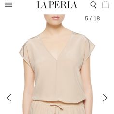 La Perla Reverie Blouse / Coverup. Nude Blush. Size It 44, Uk 12, Eu 40, Us 8. Fits Like Standard Medium. Measures 20.4” Across Flat Bust Seams. 30.75” Total Length. Model In Image Is 178 Cm Tall In Size 42, Us 6 Side Splits Come Up 12”. Deep V-Neck 10” From Shoulder Seam. An Easy Versatile Top With A Plunge Neckline And Blousy Cut With Side Splits. This Garment Is Made From Silk Crpe-De-Chine. A Wear-Anywhere Piece That Can Be Combined With Any Look. New With Tags. $456 @ La Perla Beige Silk V-neck Top, Plunge Neckline, Side Splits, Silk Crepe, Side Split, Plunging Neckline, Deep V Neck, New Color, Cover Up